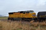 UP SD59MX #9907, running LHF, leads the southbound Cache Valley Local (LCG-41E) next to Utah Route 23 at Cache Junction, Utah. April 15, 2022